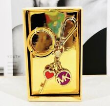 Michael Kors gold tone purse charm keychain charm picture