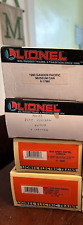 LIONEL Lot of 4 Gondola & Ore Cars Gently used. All come in original boxes. picture