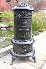Vintage Perfection Heater/Parlor Stove with insert Nice picture