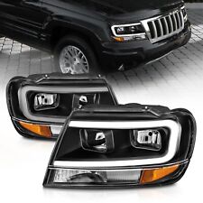 For JEEP GRAND CHEROKEE 99-04 CLEAR HEADLIGHTS BLACK HOUSING LIGHT C BAR 111537 picture