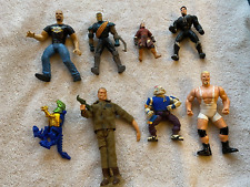 Eight (8) Action Figures- Stone Cold Steve Austin, Jeff Garrett, 6 Other Unknown picture