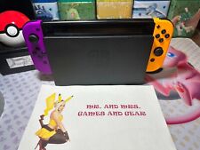Nintendo Switch 32GB Handheld System - Purple/Orange Normal Wear And Tear picture