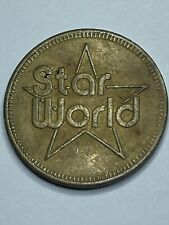 RARE STAR WORLD ARCADE TOKEN - VINTAGE 80s ARCADE BEAUTY - OLD #rg1 picture
