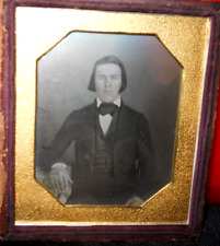 1/6th size Daguerreotype of young man in half case picture
