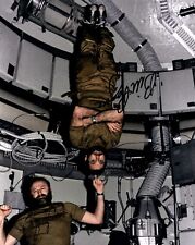 Skylab 4 Astronauts Jerry Carr and Bill Pogue Autographed Weightless Photograph picture
