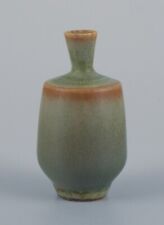 Berndt Friberg for Gustavsberg. Miniature vase with glaze in shades of green. picture