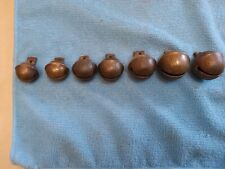 LOT OF 7 ANTIQUE BRASS GRADUATED LOOSE SLEIGH BELLS NO. 1 - NO.5 picture