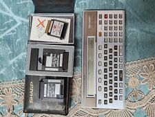 Vintage SHARP PC1500 calculator with CE-155, CE-159, CE-161 in good condition picture