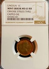 LINCOLN CENT (1C) OBVERSE STRUCK THRU CAPPED DIE-NGC MS 63 RB - RARE MINT ERROR picture