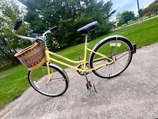 yellow vintage Schwinn breeze bicycle with removable basket picture