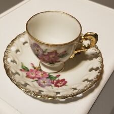Antique Unmarked Tea Cup and Saucer picture
