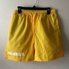 75th and canal Yellow shorts, “Still Holdin.” size Medium picture