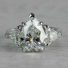 3.40 TCW Pear Cut Moissanite Three Stone Engagement Ring 14K White Gold Plated picture