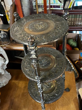 Antique Ornate Brass Three Tier Accent Table with Claw Feet and Bust Tops picture