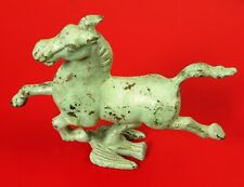 ANTIQUE CAST IRON FLYING HORSE ON THE BACK OF A BIRD AND KICKING UP HIS HEELS  picture
