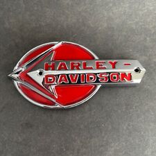 Harley Davidson 1959-1960  gas tank, nameplate, red 5.5 inches. 1 side only picture