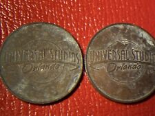 2 VERY VINTAGE Universal Studios, Orlando Game Tokens (obsolete, retired)  picture