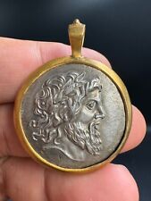 antique old Greek king Bactrian solid silver coin set into a gold plated pendant picture