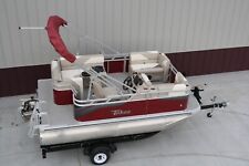 New 15 ft  pontoon boat with 25 hp four stroke Tohatsu and trailer picture