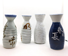 Set of 4 Ceramic Sake Bottles Blue and White, all different coordinating designs picture