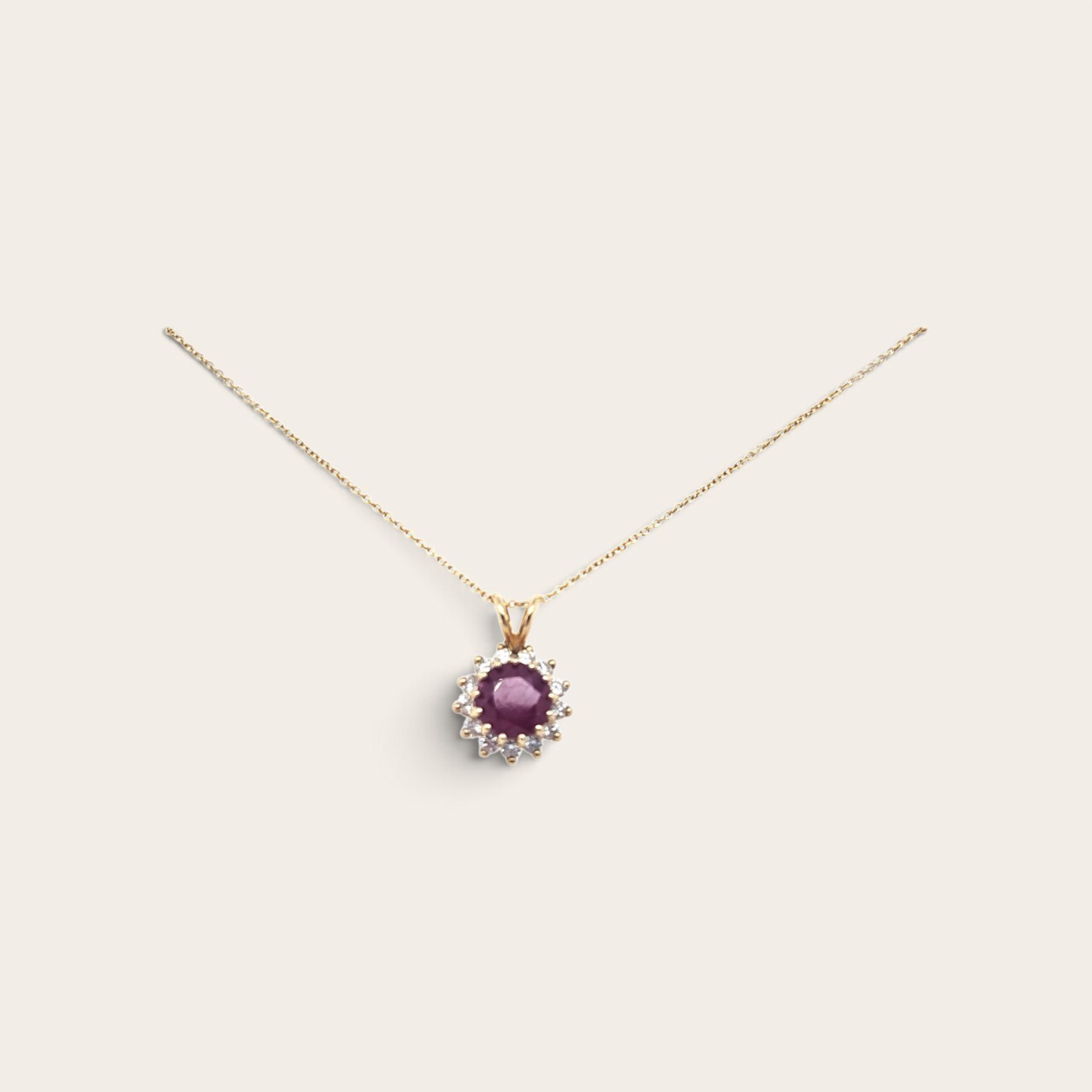 14k yellow gold ruby and diamond pendant