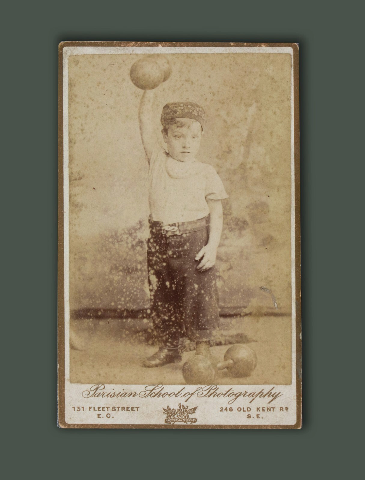 UNUSUAL CDV - Boy lifting DUMBBELL - 1880s albumen photograph - circus strongman