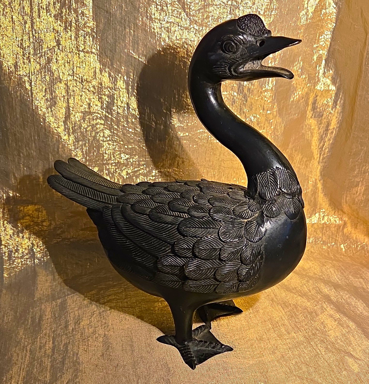 Late 19th of early 20th century Japanese patinated bronze duck sculpture.