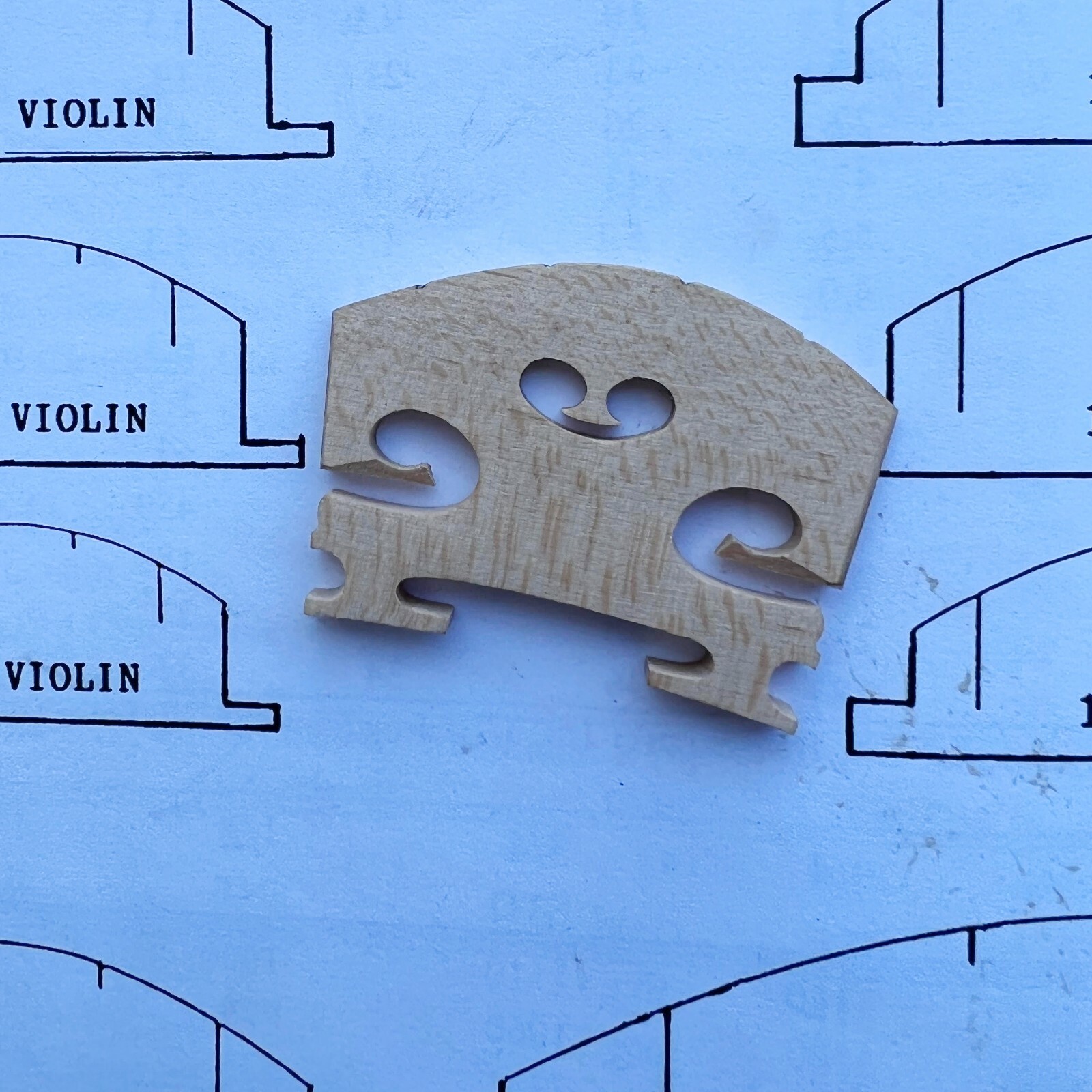 Pre-fitted with a generic cut 4/4 Size Violin Bridge Free US Shipping Maple Wood Pre-fitted with a generic cut 4/4 Size Violin Bridge Free US Shipping Maple Wood
