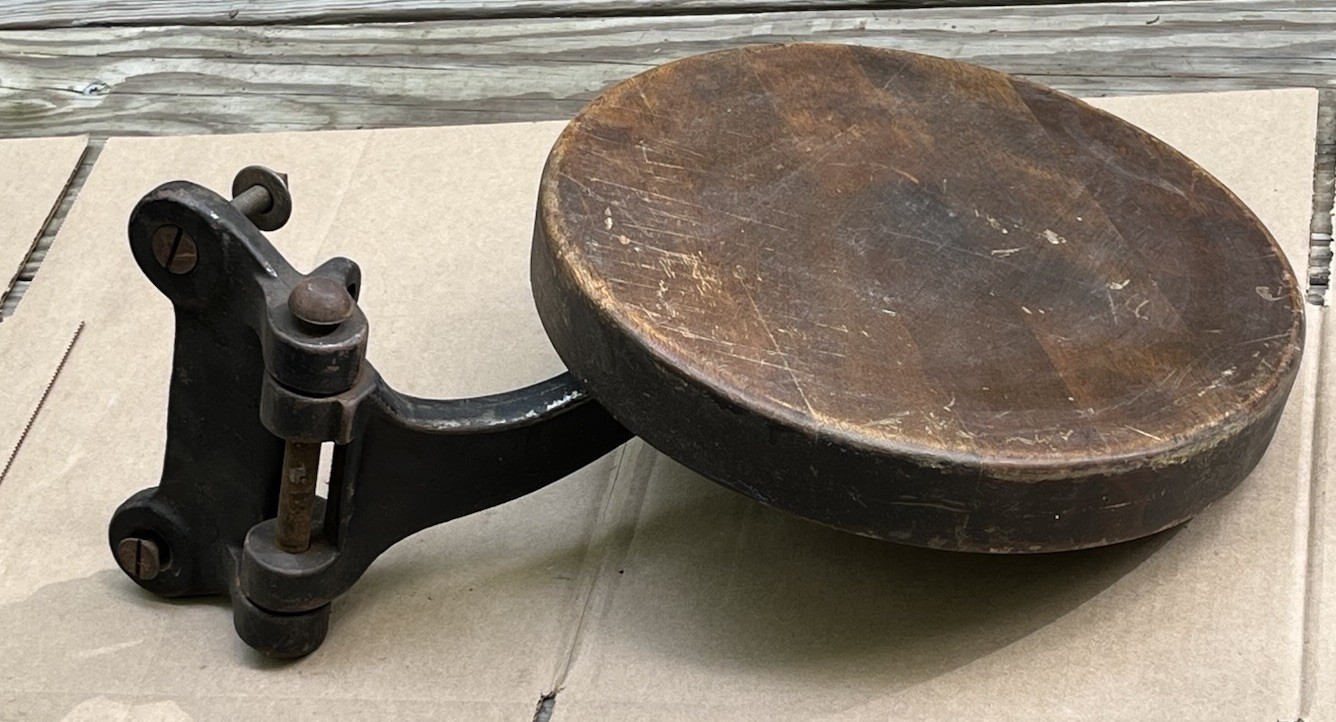 antique industrial swing out seat stool cast iron and wood 1920s