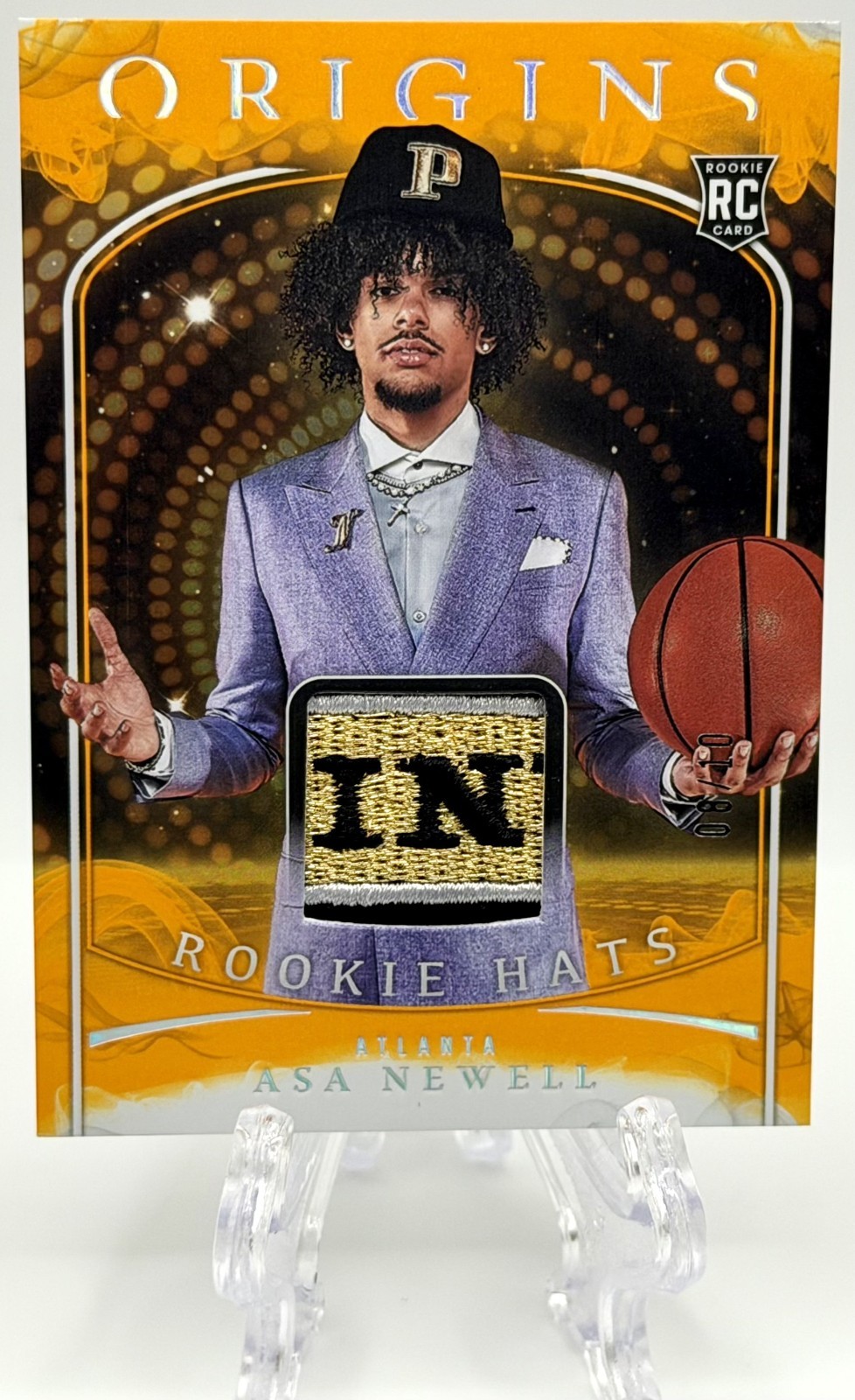 2025-26 Panini Origins Asa Newell RC Rookie Hats Player-Worn Gold #8/10 SSP