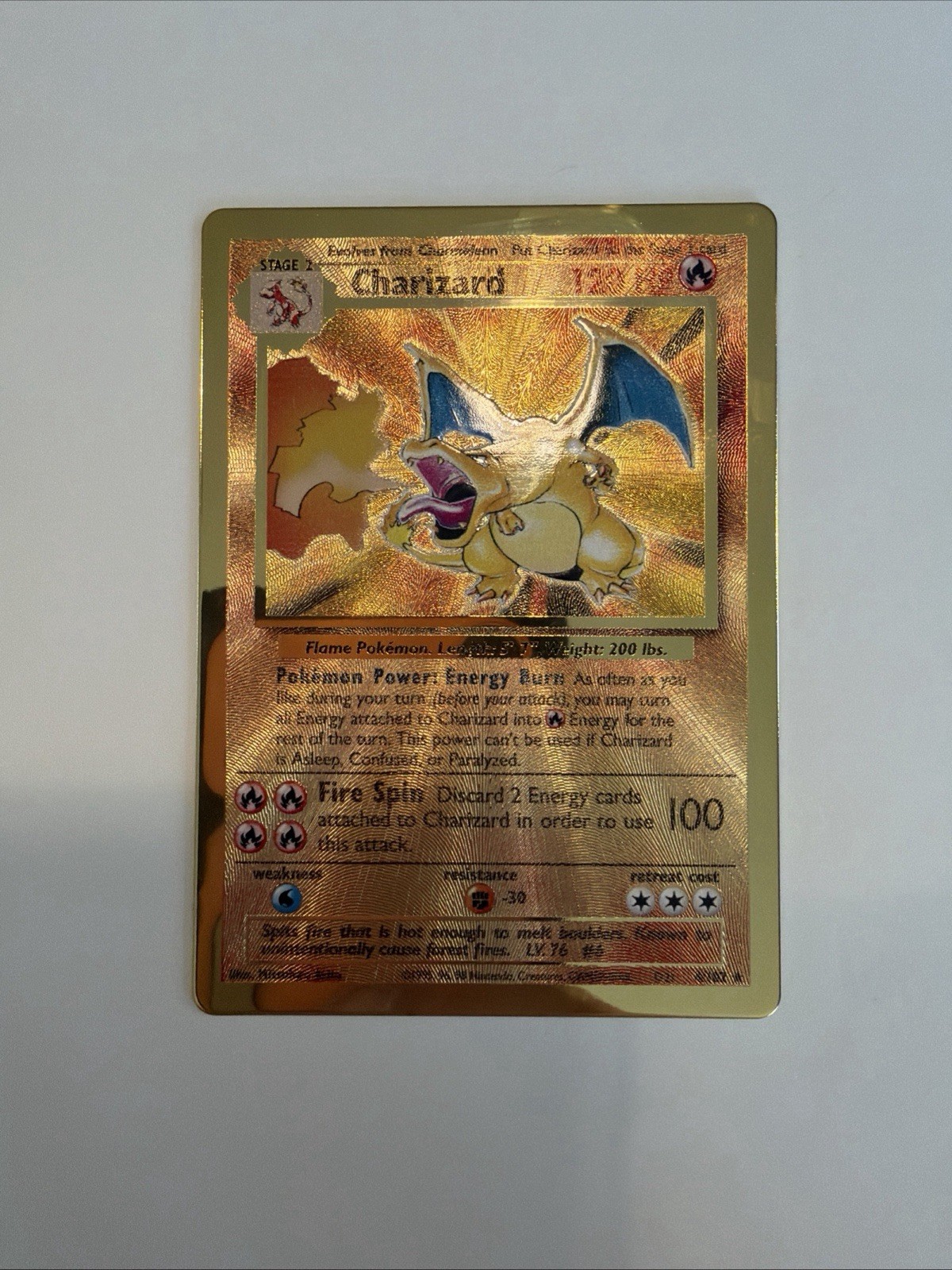 2021 Pokemon Charizard GOLD METAL Card #4/102 Celebrations UPC NM-MT. 2021 Pokemon Charizard GOLD METAL Card #4/102 Celebrations UPC NM-MT.