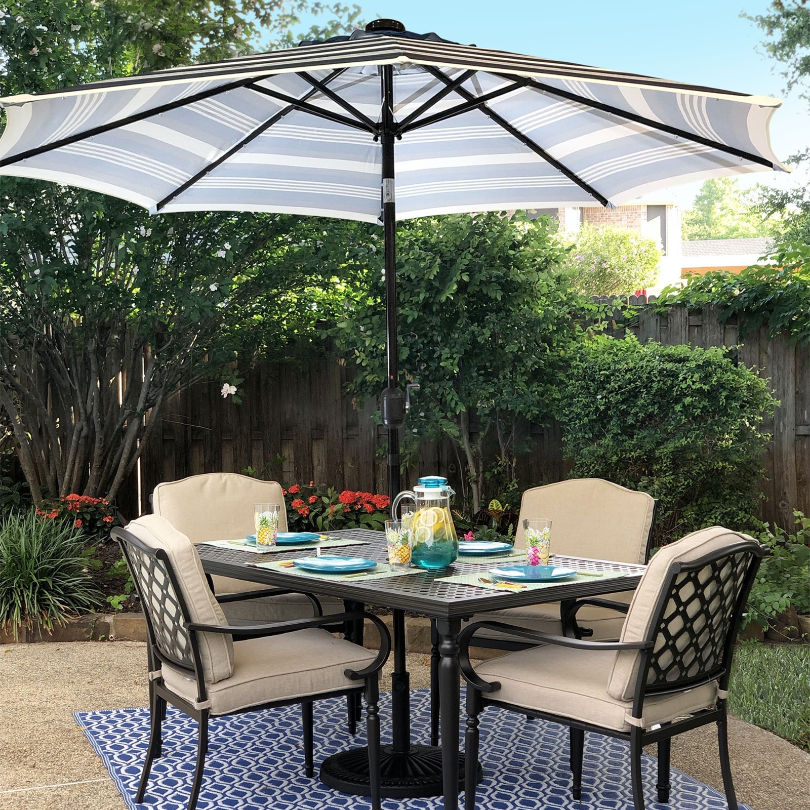 Sun-Ray9 Round Patio Umbrella with Solar Powered LED Lights, Tilt and Crank Lift