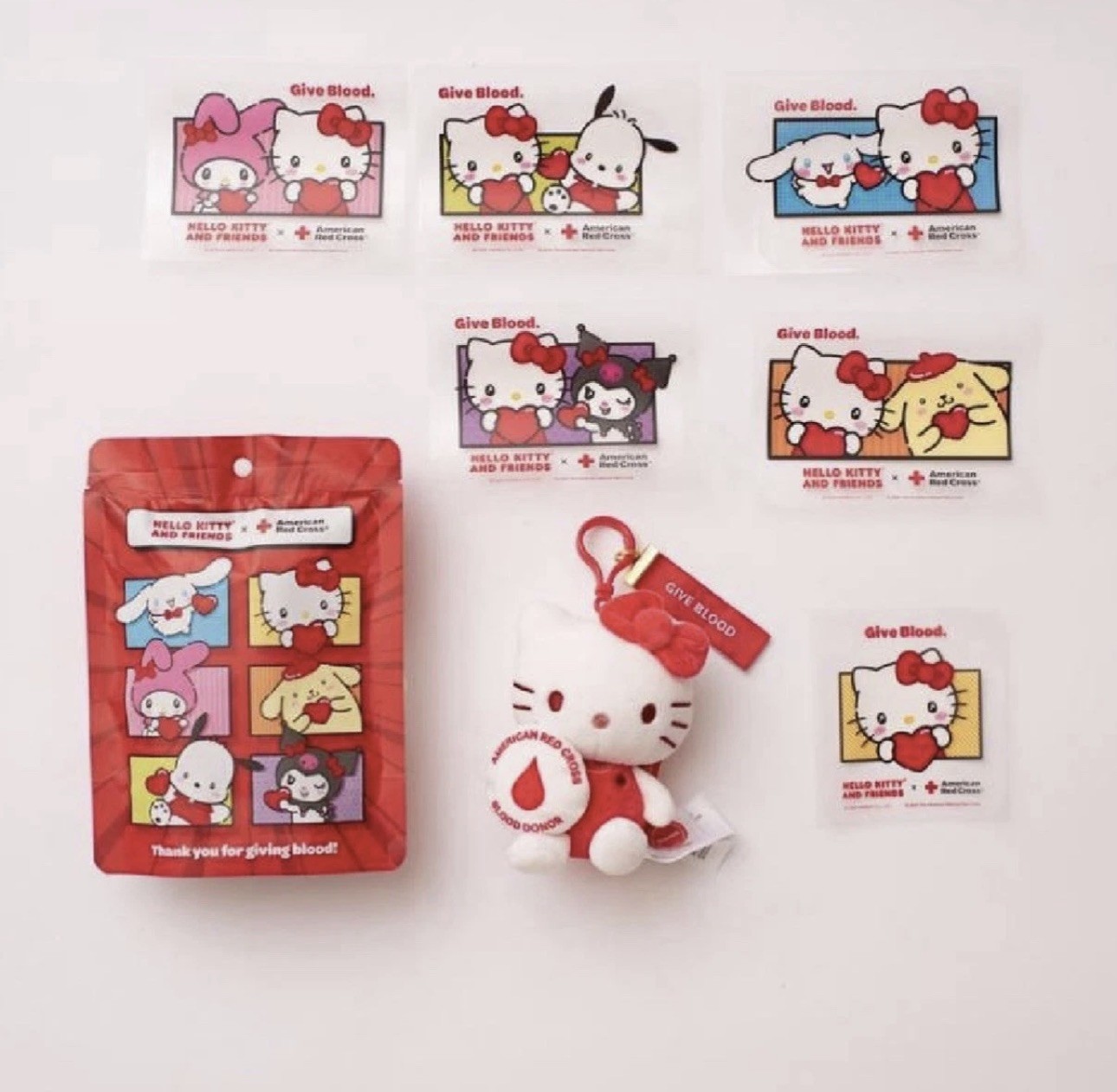American Redcross X Hello Kitty Plush Bag & Surprise Stickers (unopened) American Redcross X Hello Kitty Plush Bag & Surprise Stickers (unopened)