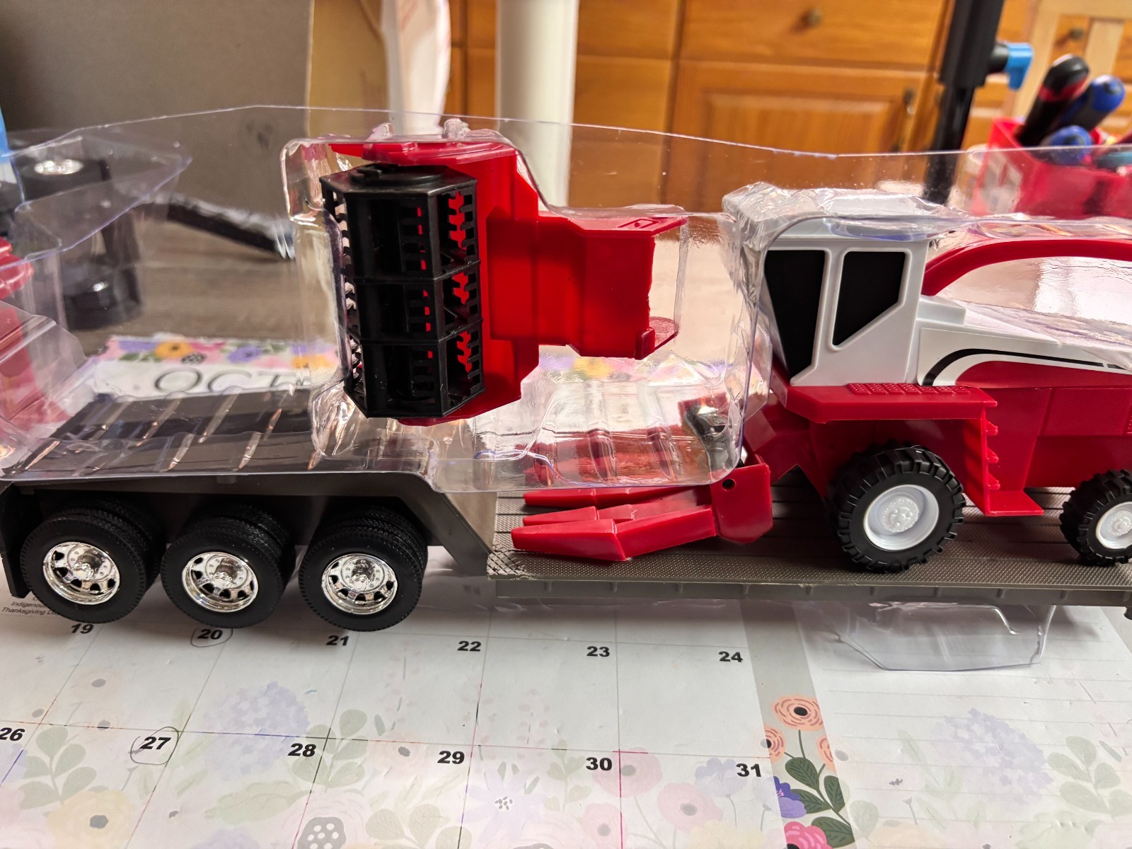 NEW RAY NEW GRAY LOWBOY TRAILER W/ COMBINE , NO PACKAGING #C 873 NEW RAY NEW GRAY LOWBOY TRAILER W/ COMBINE , NO PACKAGING #C 873