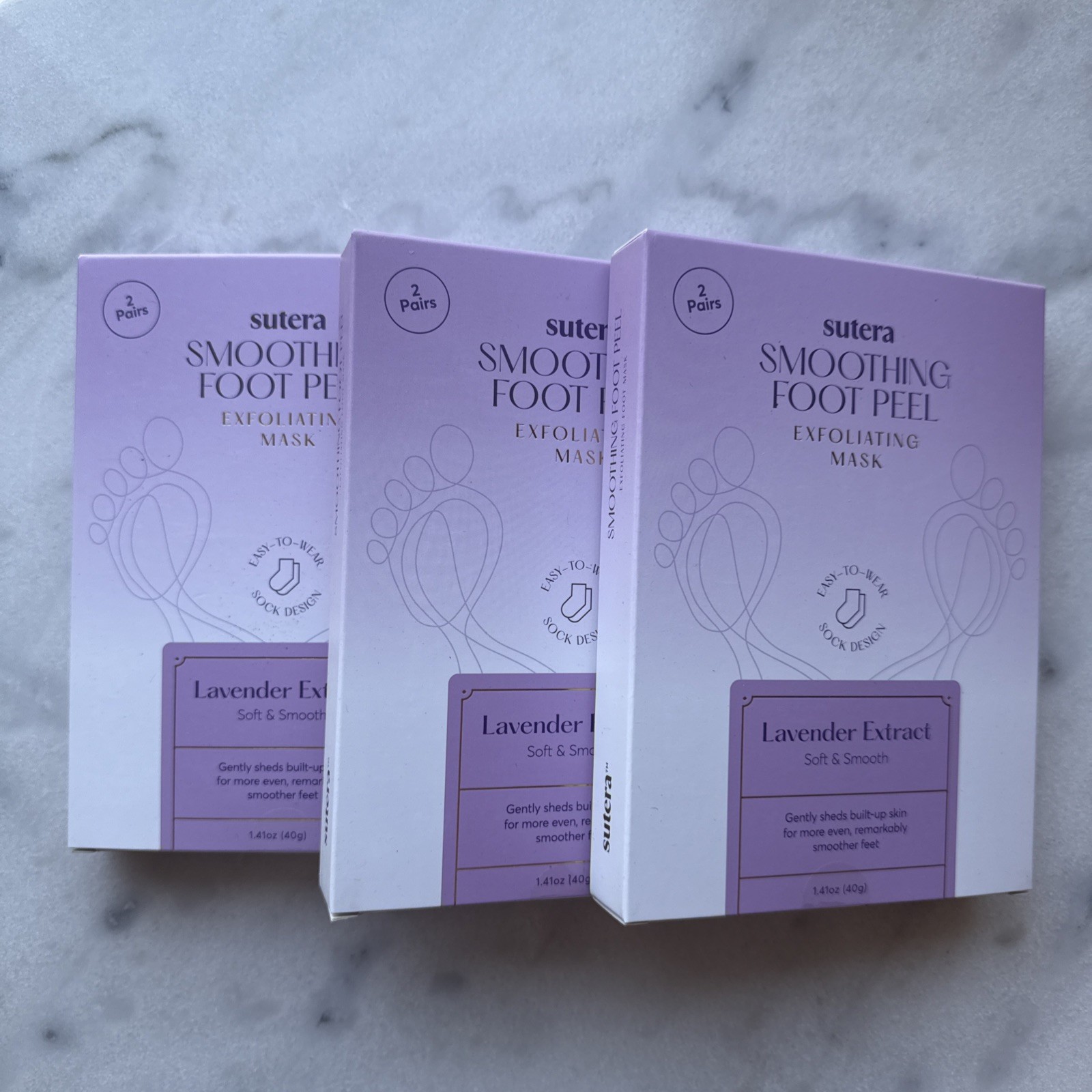 Sutera SMOOTHING FOOT PEEL- EXP:12/21. Lavender Extract PACK OF 3(6 MASK) Sutera SMOOTHING FOOT PEEL- EXP:12/21. Lavender Extract PACK OF 3(6 MASK)