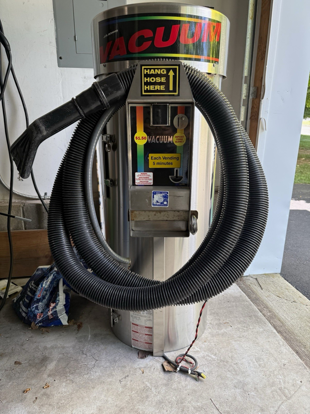 Commercial Coin-Operated Wall-Mounted Canister Vacuum w/ Hose, Corded Silver Commercial Coin-Operated Wall-Mounted Canister Vacuum w/ Hose, Corded Silver