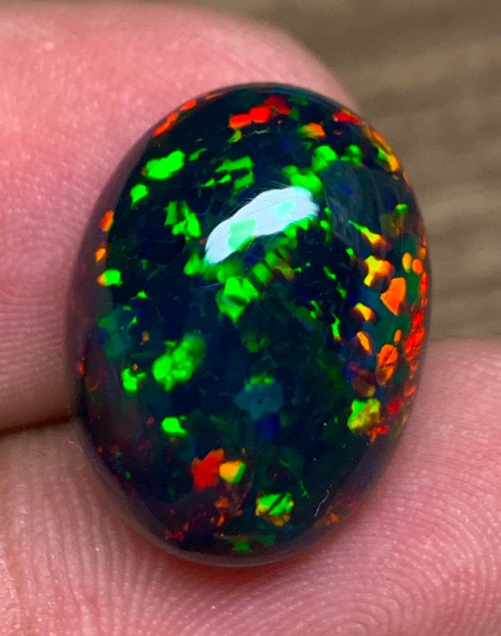 Honeycomb Black Ethiopian Opal 9.30 Carats Oval Cabochon having Pin Fire
