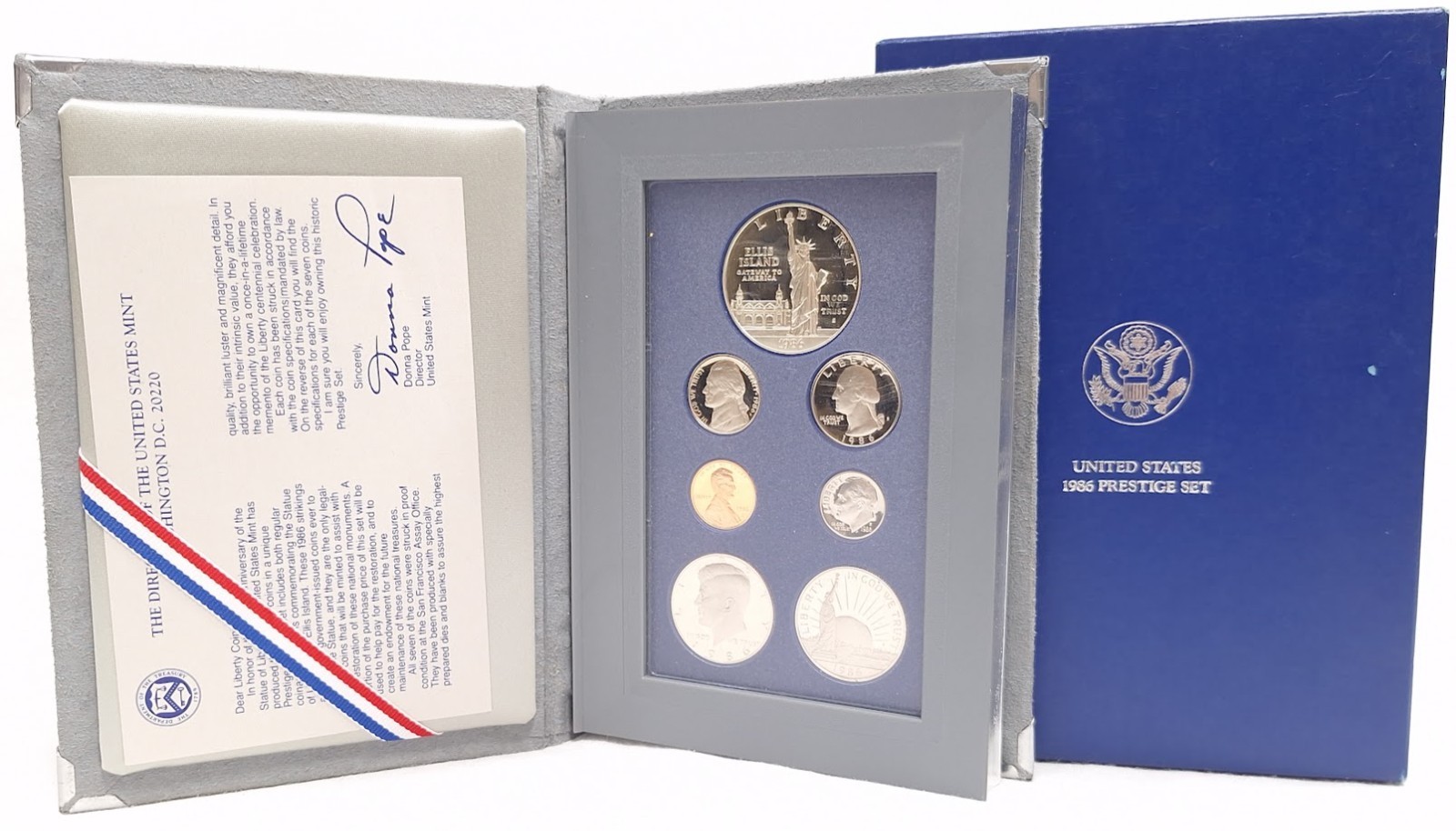 1986 US Mint Prestige 7 Coin Set Liberty Silver Dollar w/ Box & COA (11112499)
