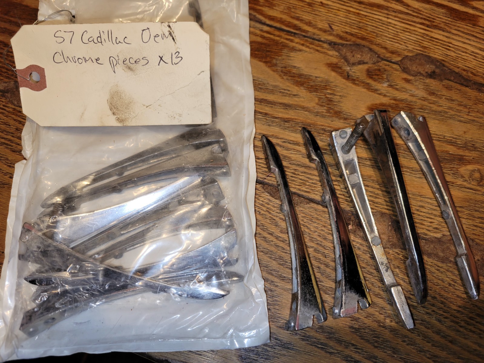 1957 CADILLAC CONV COUPE QUARTER PANEL FAUX VENT MOLDING TRIM RIBS 13 TOTAL OEM 1957 CADILLAC CONV COUPE QUARTER PANEL FAUX VENT MOLDING TRIM RIBS 13 TOTAL OEM