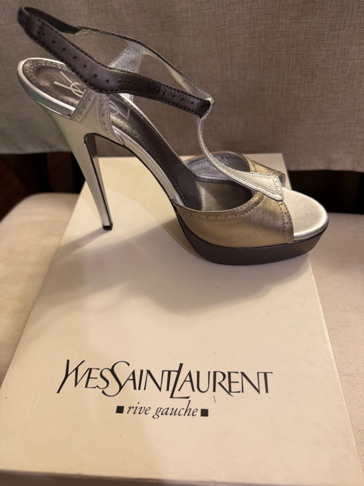 Beautiful vintage YSL leather stiletto heels featuring an elegant silver and gol Beautiful vintage YSL leather stiletto heels featuring an elegant silver and gol