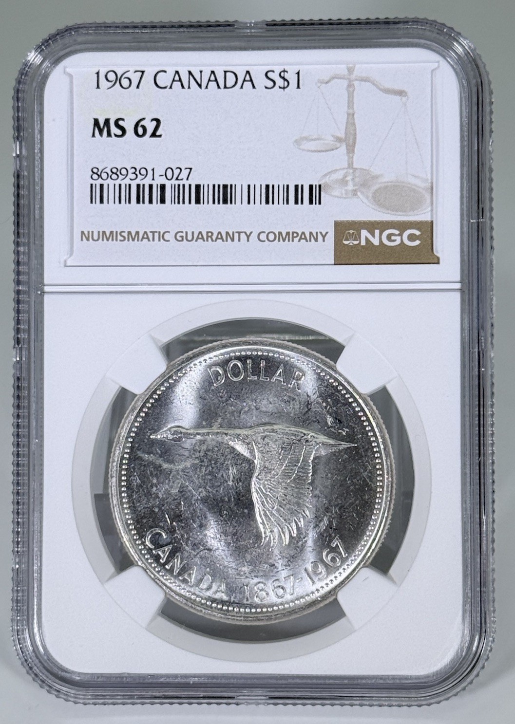 1967 S$1 CANADA SILVER FLYING GOOSE DOLLAR NGC MS62 UNCIRCULATED COIN 1967 S$1 CANADA SILVER FLYING GOOSE DOLLAR NGC MS62 UNCIRCULATED COIN