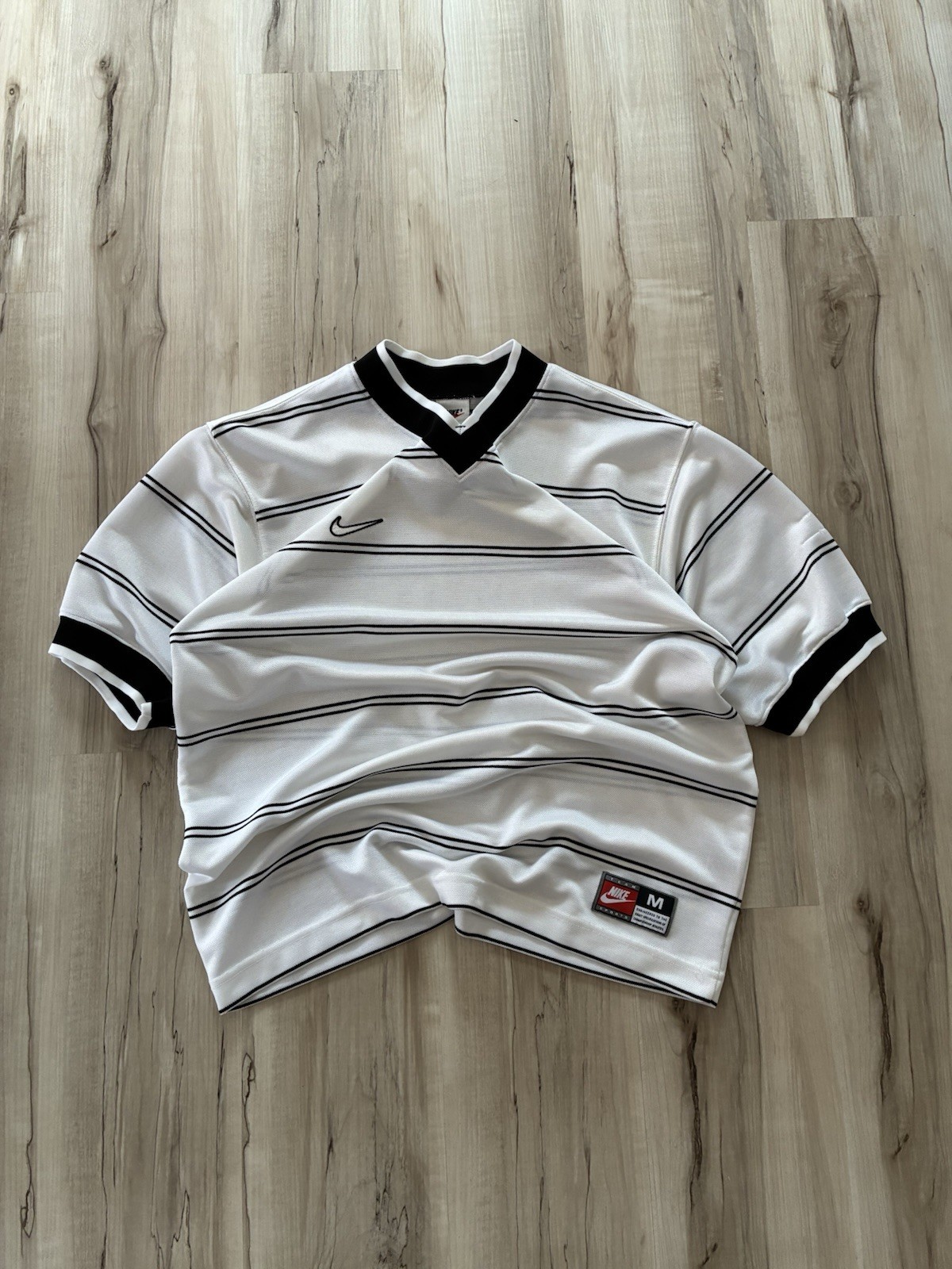 Vintage 90s Made in USA White and Black stripped Soccer/Football Jersey Vintage 90s Made in USA White and Black stripped Soccer/Football Jersey