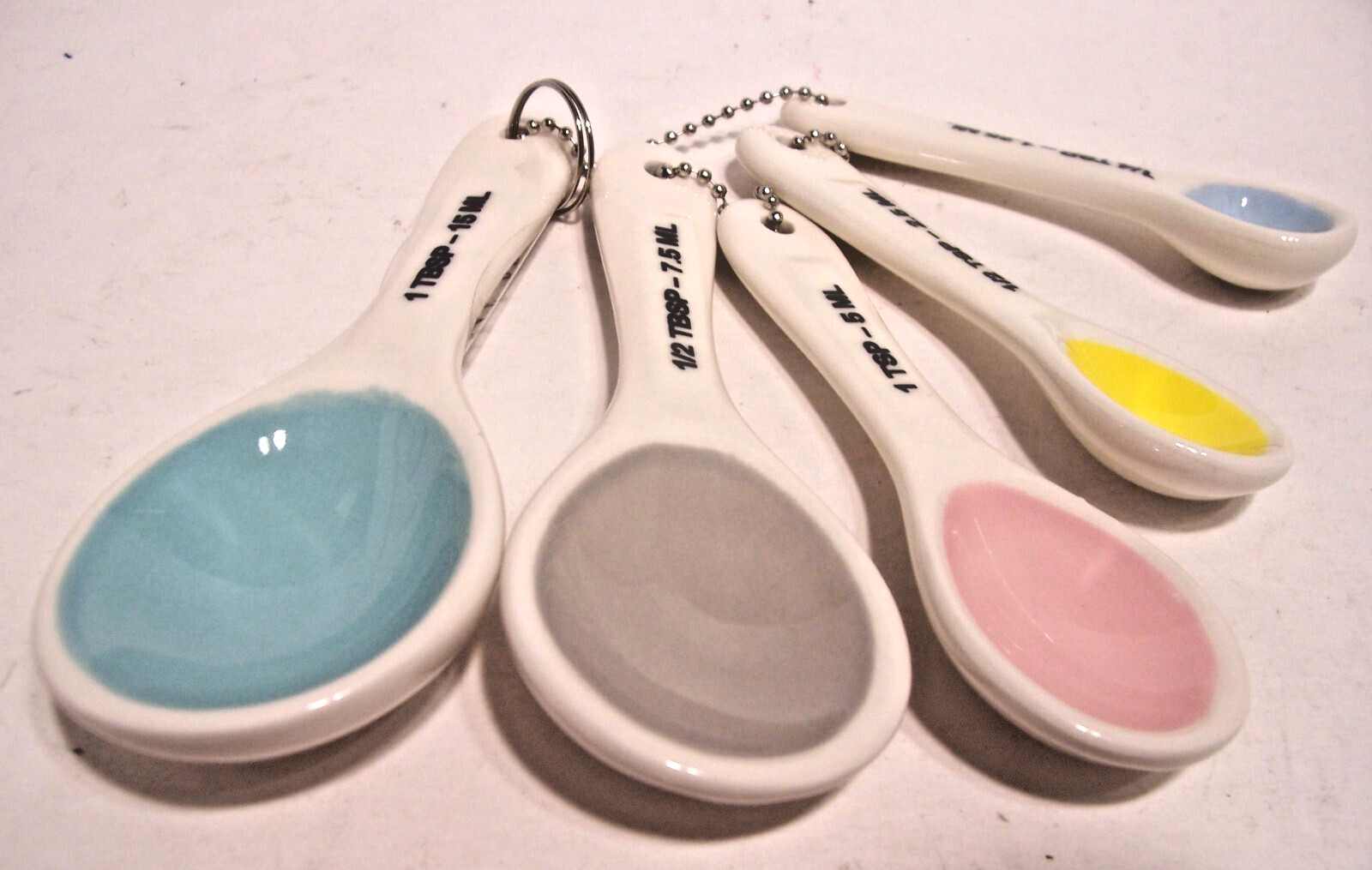Rae Dunn Colorful White Ceramic Measuring Spoons 5 pc. Set NIB- Special Buy Rae Dunn Colorful White Ceramic Measuring Spoons 5 pc. Set NIB- Special Buy