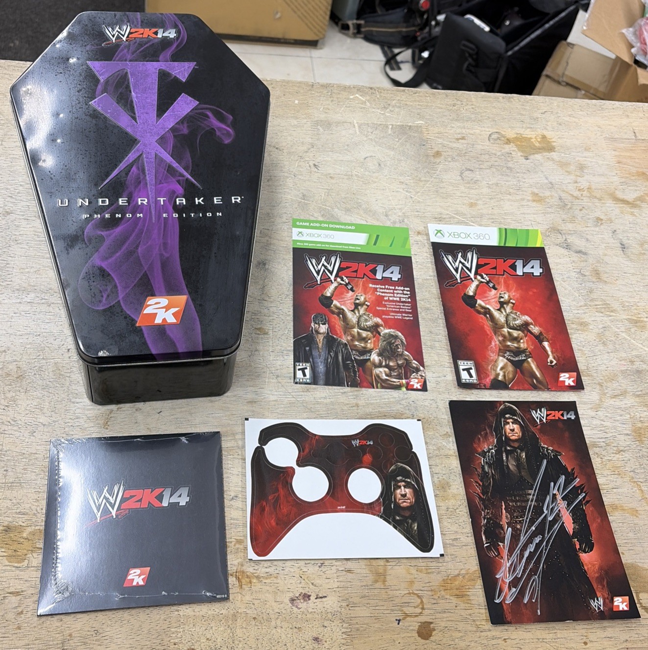 WWE 2k14 Undertaker Phenom Edition Xbox 360 (No Game,Collectible Tin,Autograph) WWE 2k14 Undertaker Phenom Edition Xbox 360 (No Game,Collectible Tin,Autograph)