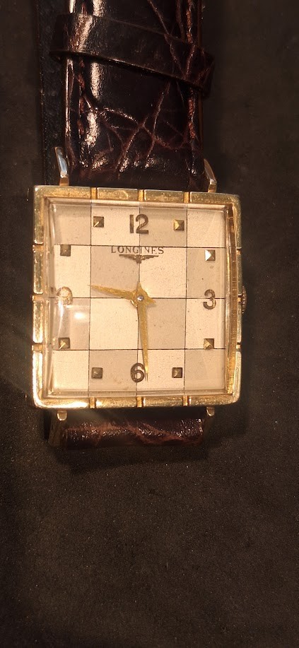 Rare 1956 Longines mens watch with checker dial with original box, running. Rare 1956 Longines mens watch with checker dial with original box, running.