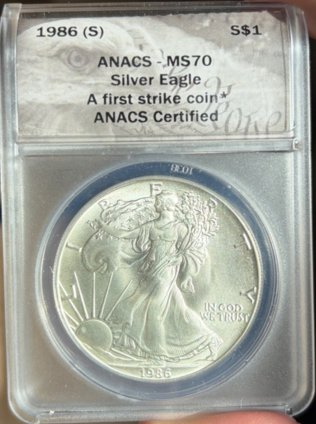 1986 (S) $1 AMERICAN SILVER EAGLE ANACS MS70 First Strike Coin