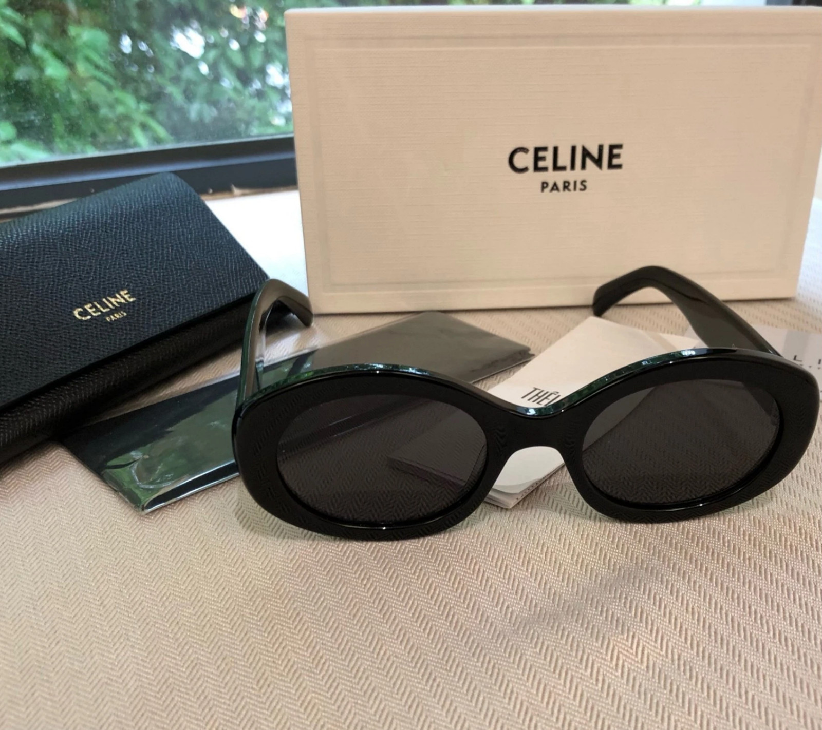 Celine CL40194U Triomphe Oval Women Sunglasses Black Frame & Dark Grey Lens Celine CL40194U Triomphe Oval Women Sunglasses Black Frame & Dark Grey Lens