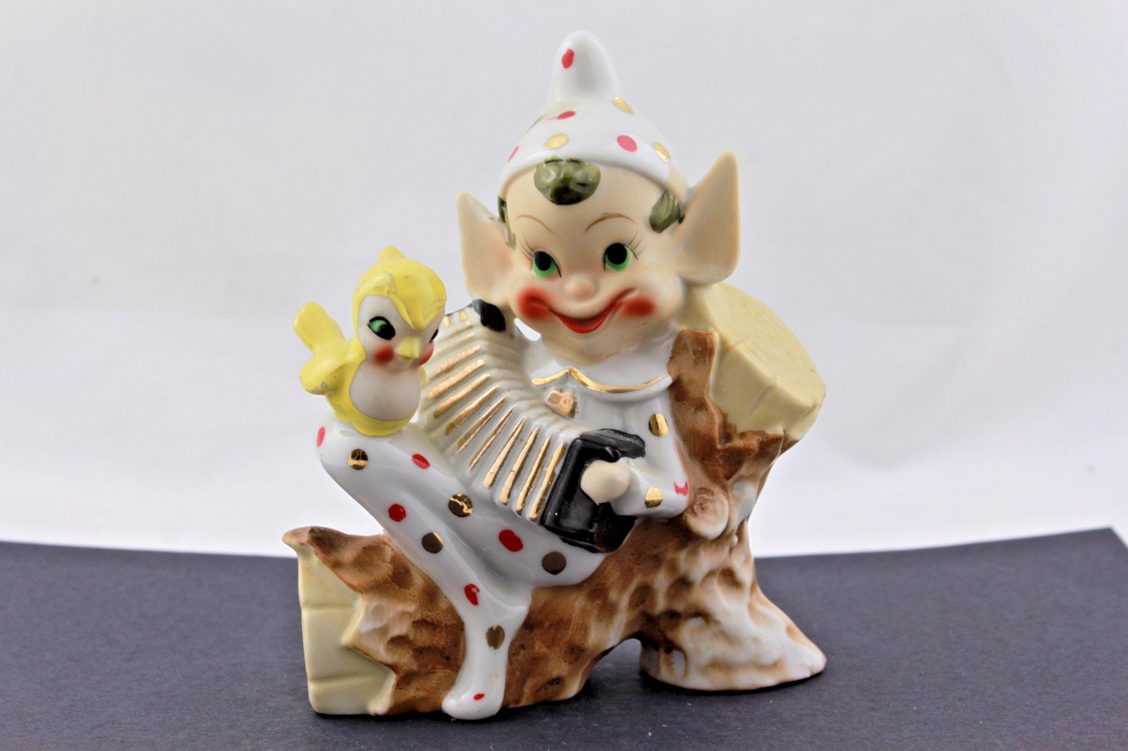 VINTAGE PORCELAIN POLKA DOT PIXIE ELF W/BIRD ON LOG PLAYING MUSIC - JAPAN VINTAGE PORCELAIN POLKA DOT PIXIE ELF W/BIRD ON LOG PLAYING MUSIC - JAPAN