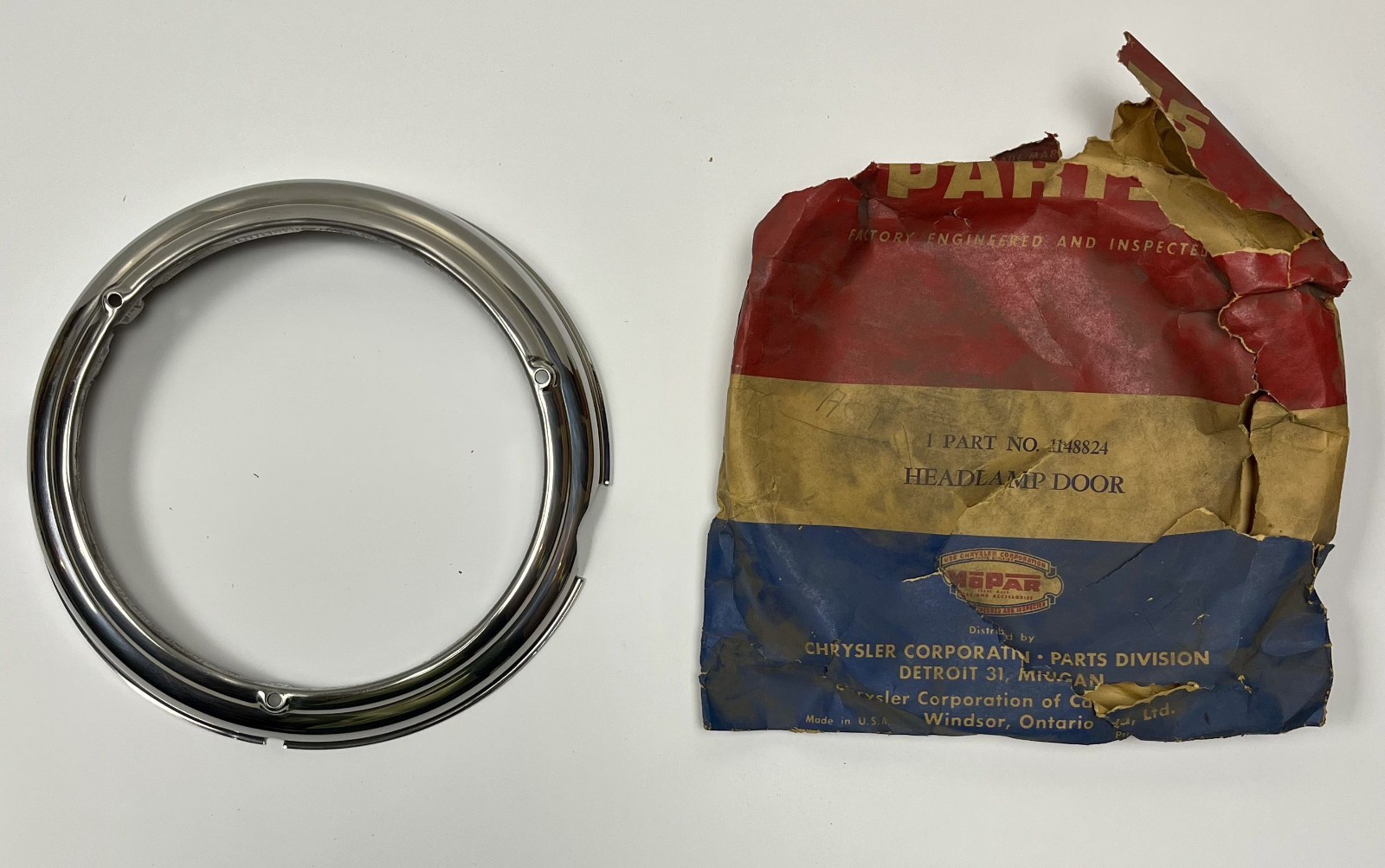New Old Stock Headlight Bezel for 1946-48 Plymouth Models Mopar #1148824 New Old Stock Headlight Bezel for 1946-48 Plymouth Models Mopar #1148824