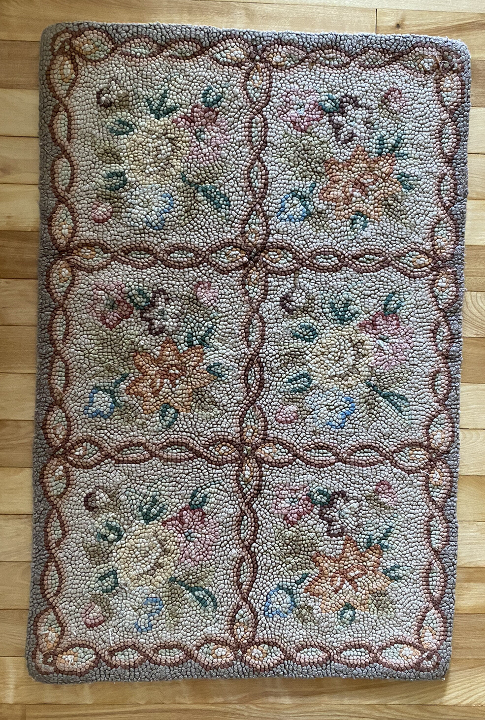 Primitive American Vintage hand-hooked woolen Geometric Floral rug 31.5” X 20.5” Primitive American Vintage hand-hooked woolen Geometric Floral rug 31.5” X 20.5”